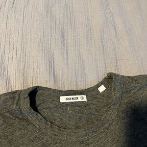 Buck Mason olive/black slub cotton tee shirt.